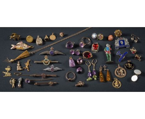 A collection of charms, pins, gold jewellery items, an amethyst single-stone ring, pendants and miscellaneous earrings.: