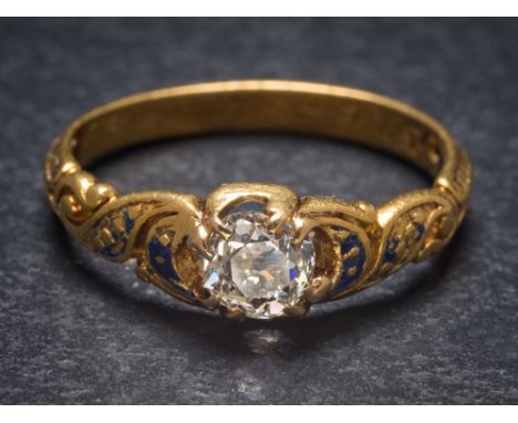 A mid 19th Century gold and diamond single-stone ring: the round old brilliant-cut diamond approximately 0.35ct on a shank wi