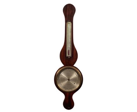 P. Barbon, a mahogany wheel barometer: the round silvered eight-inch dial engraved with usual barometer markings and signed P