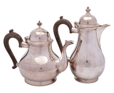 A George V silver teapot, maker Manoah Rhodes&amp; Sons Ltd, London, 1918: inscribed, of squat globular form with domed hinge