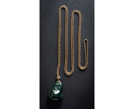A bloodstone boulder pendant approximately 42mm long x 34mm wide, on an oval-link guard chain.:
