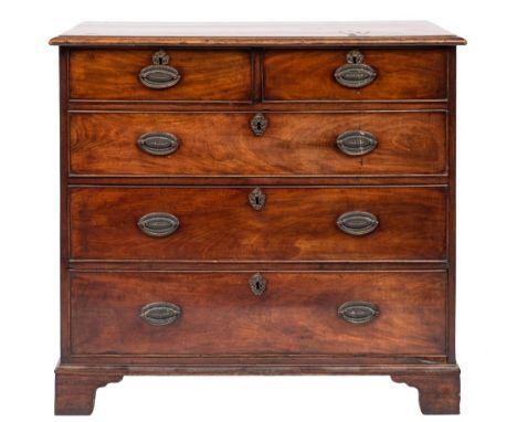 A George III mahogany rectangular chest: the top with a moulded edge containing two short and three long drawers on bracket f