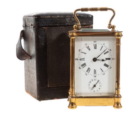 An Edwardian French brass carriage clock: the eight-day duration timepiece movement having a later platform lever escapement,