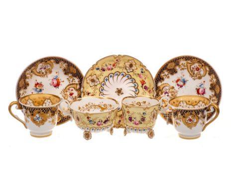 A small group of early 19th century teawares: comprising an H. & R. Daniel trio in the 'C' scroll shape the cups set on flowe