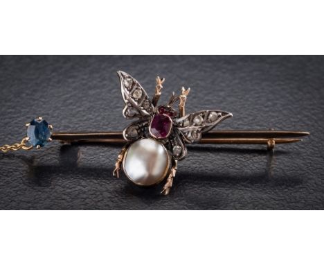 A ruby, diamond and gem-set butterfly bar brooch: designed as a small butterfly with outstretched wings 21mm wingspan,  pave-