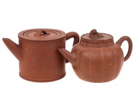 Two Chinese Yixing stoneware teapots: both of light brown hue, one of melon shaped form with simple handle and spout, the fla