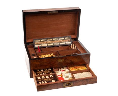 A late Victorian/Edwardian burr walnut games compendium: of rectangular outline, the hinged lid enclosing fitted compartments