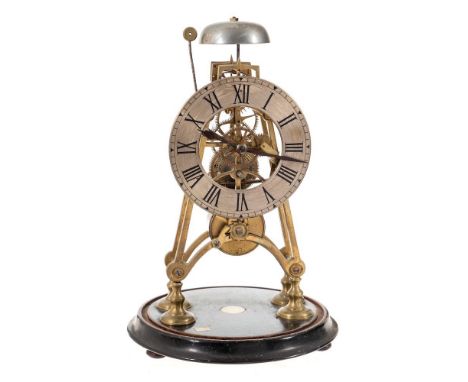 A late 19th Century English brass skeleton clock: the eight-day duration timepiece fusee movement having tapering plates and 