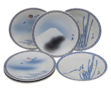 A set of six Japanese porcelain plates:  painted with irises, Mount Fuji and cranes flying in a moonlit sky, waves below, var