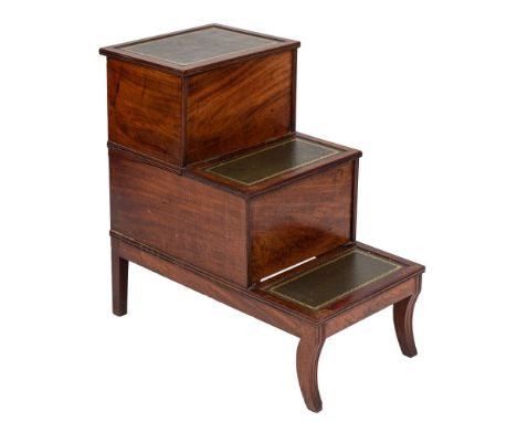 A Regency mahogany step commode:, the three treads with tooled leather inset panels, having a hinged upper step with box inte