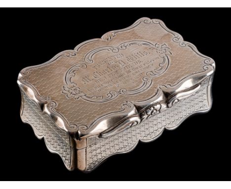 A Victorian silver snuff box, maker Alfred Taylor, Birmingham, 1854: inscribed, of rectangular outline, with engine-turned de