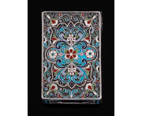 An Imperial Russian silver and enamel matchbox holder, stamped Kokoshnik mark and maker's mark: of rectangular outline, with 