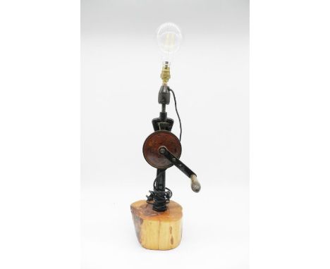 A steampunk table lamp in the form of a hand drill on wooden base - height 68cm