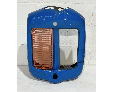 A nose cone/grill from a vintage tractor - possibly a Fordson Dexta