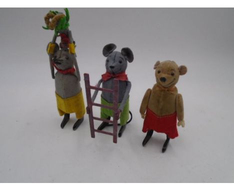 Three vintage Schuco clockwork tinplate toys in the form of mice, one with a ladder and another dancing