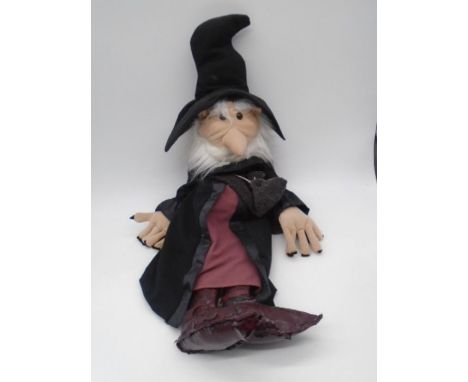 A hand puppet in the form of a wizard, made by The Puppet Company