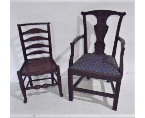 A Hepplewhite style chair with carved decoration along with an antique ladder back country chair