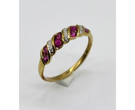 A 9ct gold ruby and diamond dress ring