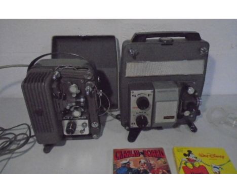 A Bell Scope R-50 movie projector plus one other, with three films, Charlie Chaplin - Charlie on board, Walt Disney - Bone Tr