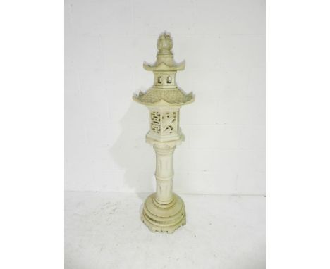 A vintage resin sectional garden pagoda - height 136cm