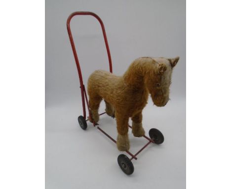 A vintage child's pull-along horse by International Model Aircraft Ltd