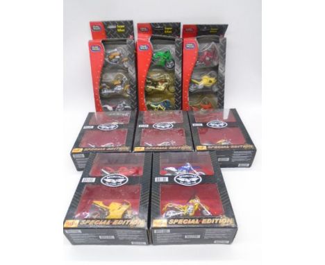 A collection of five double boxed die-cast and plastic special edition Maisto Motorcycle's (1:18 scale), along with three Cha