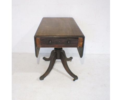 A Regency sofa table with single drawer.