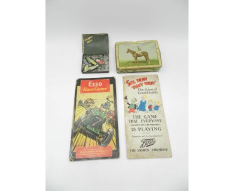 A vintage Esso race game along with two vintage tins etc