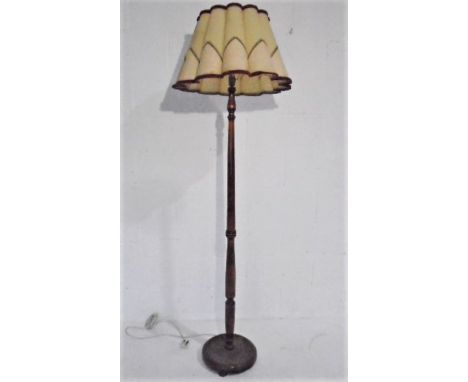 A vintage standard lamp with original fluted shade. 