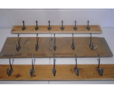 Three vintage coat racks