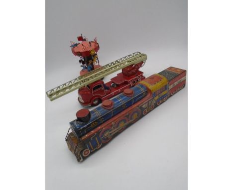 A vintage German tinplate fire engine with bell and extendable ladder, along with a Mettoy "The Chief" tinplate locomotive an