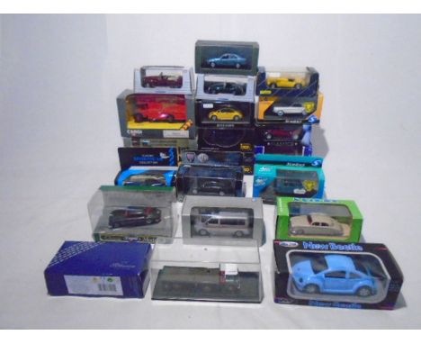A collection of various boxed die-cast vehicles including Corgi Classics, Paul's Model Cart Minichamps, Ixo models. Lledo Van