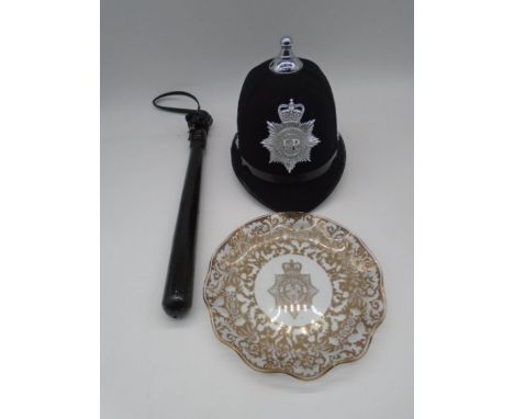 A vintage Devon &amp; Cornwall Constabulary police officers helmet, along with a truncheon and Merseyside Police Club glass d