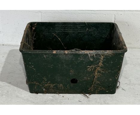 A small cast iron trough with makers name E &amp; H Roberts