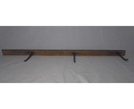 A vintage set of meat hooks