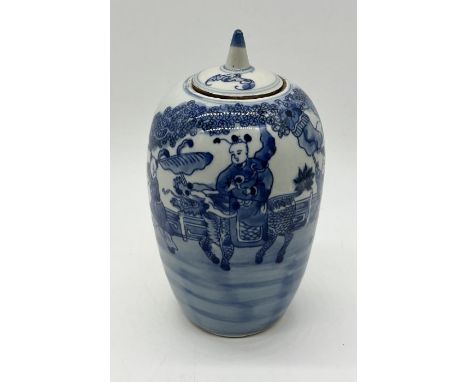 A 19th century Chinese blue and white lidded jar with double ring mark to base
