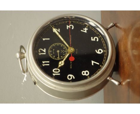 Early to mid 20th century 'Goliath Repeater' circular polished metal alarm clock, black dial with Arabic numerals, subsidiary