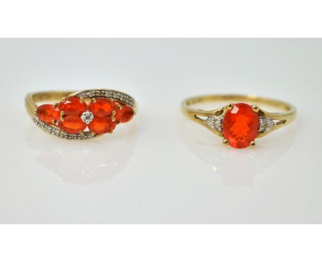 Two Mexican fire opal and diamond gold rings hallmarked 9ct   Condition Report  4.4gmSize T and P Click here for further imag