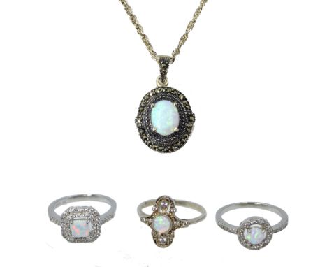 Opal and marcasite pendant necklace and three opal dress rings stamped 925 or sil   Condition Report   Click here for further