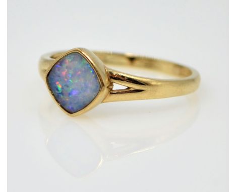Gold opal square rim set ring hallmarked 9ct   Condition Report  size S2.1gm Click here for further images, condition, auctio