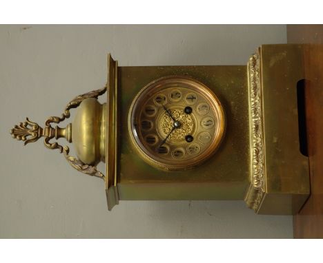 Early 20th century gilt metal and brass mantel clock, concave Arabic dial with pierced floral mount, stepped acanthus moulded