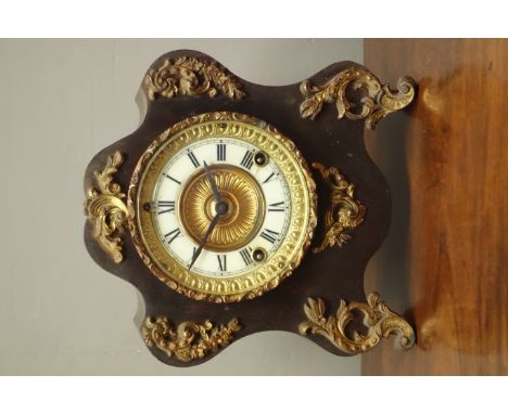 Late19th century ornate cartouche shaped mantel clock by 'Ansonia Clock Co.', scrolled gilt metal mounts and feet, twin train