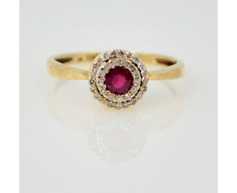 Gold ruby & diamond halo set ring hallmarked 9ct   Condition Report  size M-N2.2gm Click here for further images, condition, 