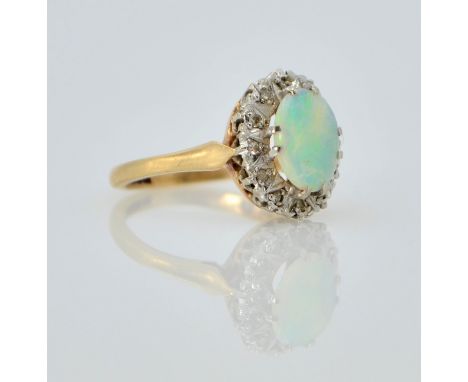 Opal and diamond gold cluster ring hallmarked 9ct    Condition Report  Approx 3gm size J - K Click here for further images, c