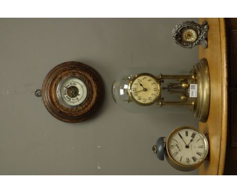 Late 20th century anniversary torsion clock under glass dome, Art Nouveau style clock, 20th century brass drum alarm clock an