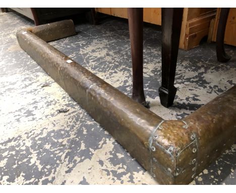 A VINTAGE COPPER WRAPPED FIRE FENDER. 