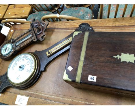 TWO VINTAGE WALL BAROMETERS, AND A BRASS BOUND WRITING BOX WITH VACANT INTERIOR.
