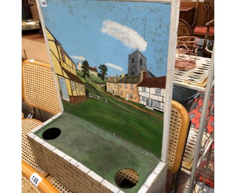 A VINTAGE DIORAMA STAND.