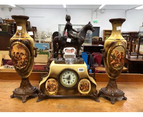 AN EDWARDIAN CLOCK GARNITURE. 
