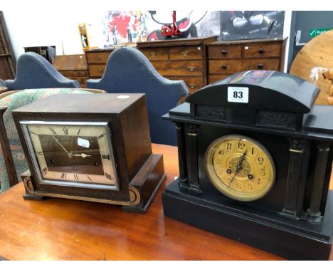 A VICTORIAN BLACK SLATE MANTLE CLOCK AND A ART DECO CLOCK BY GARRARD. 